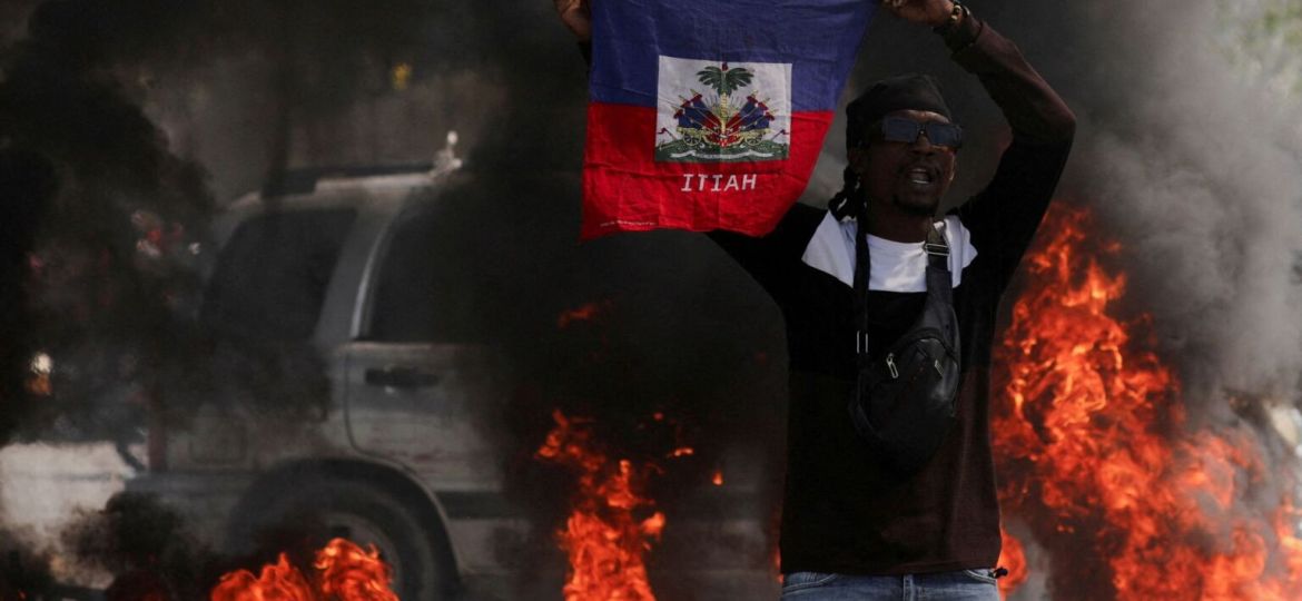 FILE PHOTO: People demonstrate against the government and insecurity in Port-au-Prince